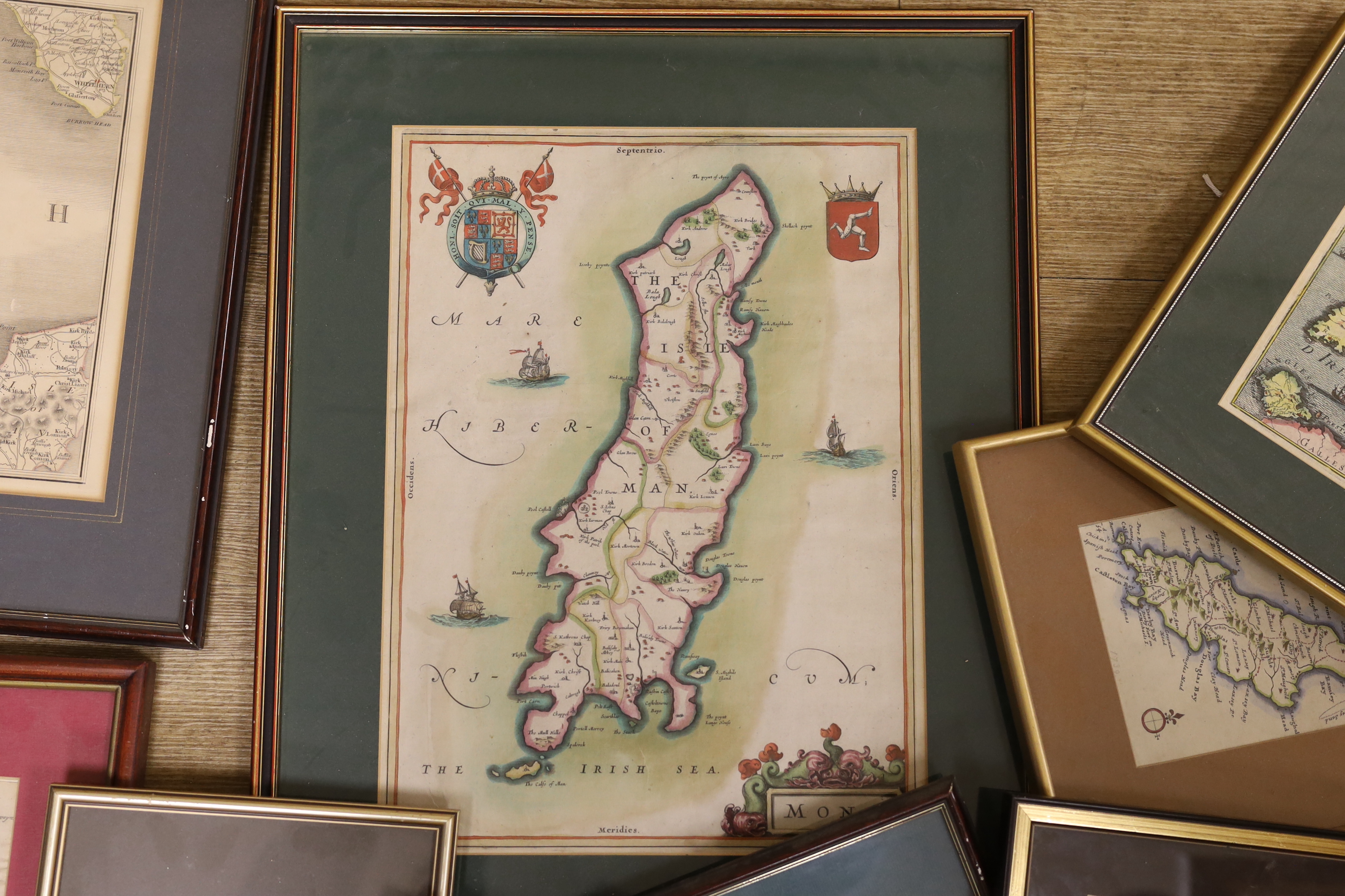 Twelve antique and later maps of the Isle of Man, including examples by Robert Sayer, Herman Moll and Richard Blome, mostly hand coloured, largest 38 x 28cm